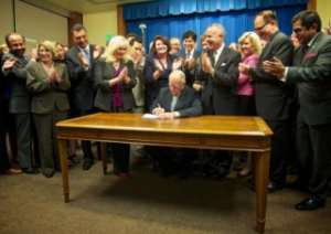 Governor Brown signs water bond legislation. Photo by Kelly Huston, Office of the Governor.